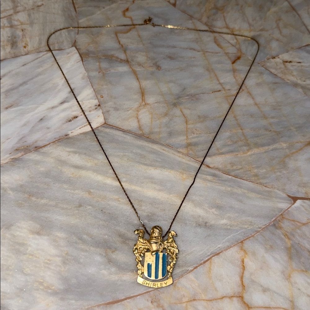 Gold and‎ Blue Crest Pendant Necklace